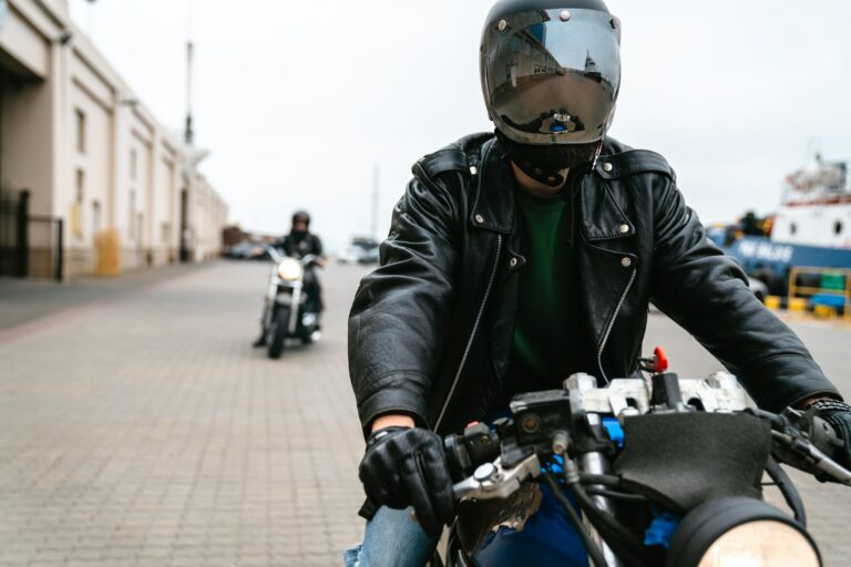 Photo of young caucasian men bikers on their bikes